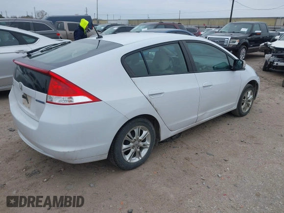 2010 Honda Insight EX with VIN JHMZE2H71AS035091, listed as a IAAI auction lot 41380128 with 181,653 mi miles and . Bid and sale history available at DreamBid. Image 4.