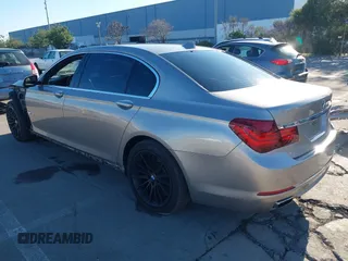 2015 BMW 7 Series 750Li with VIN WBAYE8C55FD782384, listed as a IAAI auction lot 41319363 with 75,784 mi miles. Bid and sale history available at carsss.com. Image 3.