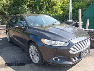 2015 Ford Fusion SE z VIN 3FA6P0H94FR308585, wystawiony jako IAAI lot #42269833 z przebiegiem 143 987 mil mil oraz . Historia ofert i sprzedaży dostępna na DreamBid. Obrazek 1.
