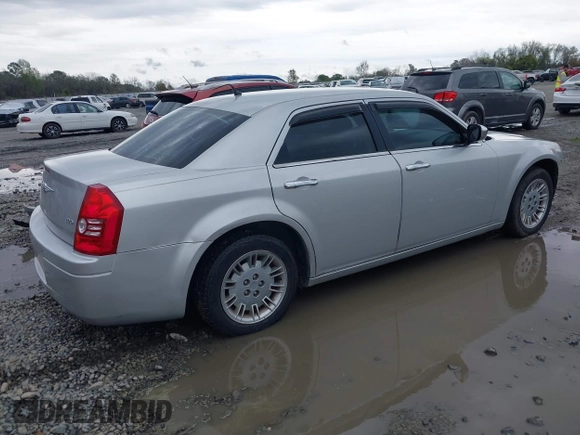 2008 Chrysler 300 LX with VIN 2C3KA43RX8H175472, listed as a IAAI auction lot 41875765 with 146,393 mi miles. Bid and sale history available at carsss.com. Image 4.