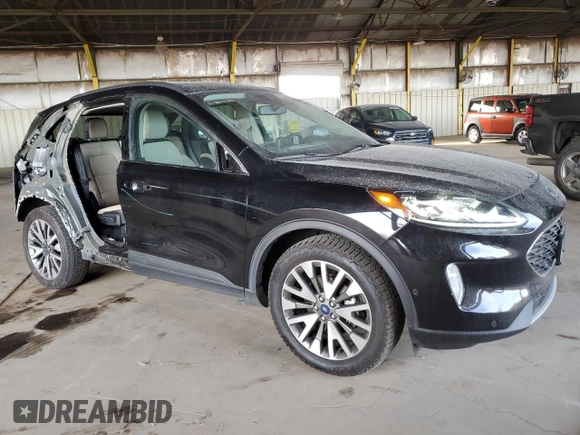 2020 Ford Escape Titanium Hybrid z VIN 1FMCU9DZ2LUB49050, wystawiony jako Copart lot #42517525 z przebiegiem 66 890 mil mil oraz Szkoda całkowita • Salvage title. Historia ofert i sprzedaży dostępna na DreamBid. Obrazek 4.