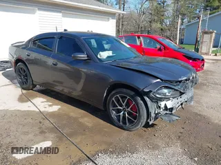 2017 Dodge Charger SXT with VIN 2C3CDXJG1HH576701, listed as a IAAI auction lot 41994010 with 71,060 mi miles and . Bid and sale history available at carsss.com. Image 1.