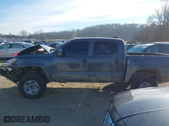 2023 Toyota Tacoma 4WD SR with VIN 3TMCZ5AN4PM582962, listed as a IAAI auction lot 41373504 with 34,138 mi miles. Bid and sale history available at carsss.com. Image 14.