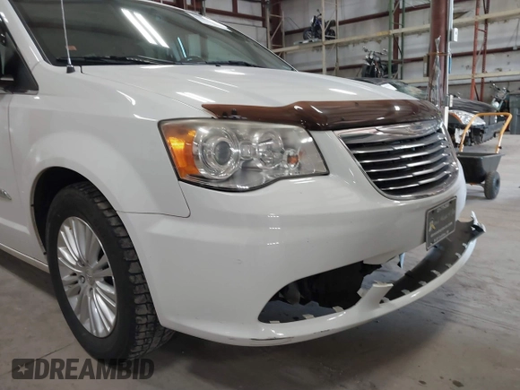 2014 Chrysler Town & Country Limited with VIN 2C4RC1GG7ER178802, listed as a IAAI auction lot 41863918 with 103,777 mi miles and . Bid and sale history available at DreamBid. Image 20.