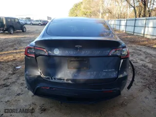 2023 Tesla Model Y Long Range with VIN 7SAYGDEE6PA081723, listed as a Copart auction lot 87232354 with 28,774 mi miles and Salvage Title. Bid and sale history available at carsss.com. Image 6.