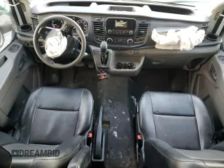 2020 Ford Transit Cargo with VIN 1FTBF4XG3LKB70573, listed as a Copart auction lot 77039474 with 131,873 mi miles and Salvage Title. Bid and sale history available at DreamBid. Image 8.