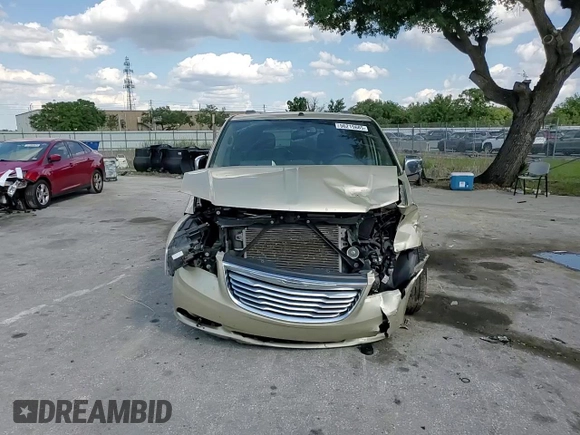 2011 Chrysler Town & Country Limited z VIN 2A4RR6DG5BR746552, wystawiony jako Copart lot #56215685 z przebiegiem 143 505 mil mil oraz Szkoda całkowita • Salvage title. Historia ofert i sprzedaży dostępna na DreamBid. Obrazek 15.