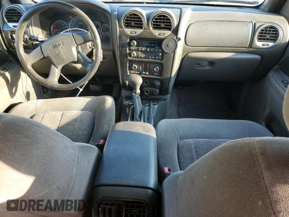 2003 GMC Envoy SLE with VIN 1GKDS13S232329083, listed as a Copart auction lot 73147534 with 212,645 mi miles and Salvage Title. Bid and sale history available at DreamBid. Image 8.