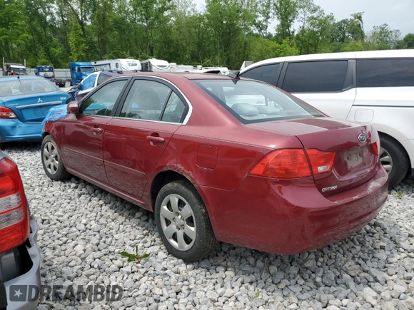 2009 Kia Optima LX z VIN KNAGE228795334599, wystawiony jako Copart lot #59276515 z przebiegiem 180 399 mil mil oraz Szkoda całkowita • Salvage title. Historia ofert i sprzedaży dostępna na DreamBid. Obrazek 2.