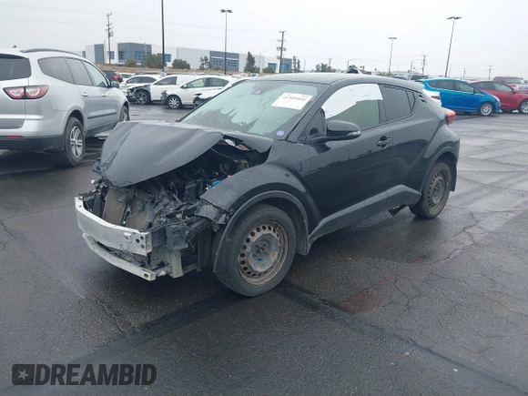 2021 Toyota C-HR LE with VIN JTNKHMBX9M1116943, listed as a IAAI auction lot 41369464 with Not Provided miles. Bid and sale history available at carsss.com. Image 2.