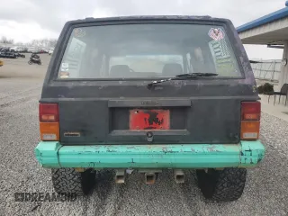 1993 Jeep Cherokee Sport with VIN 1J4FJ68S6PL506709, listed as a Copart auction lot 86638434 with 253,923 mi miles and Salvage Title. Bid and sale history available at carsss.com. Image 6.