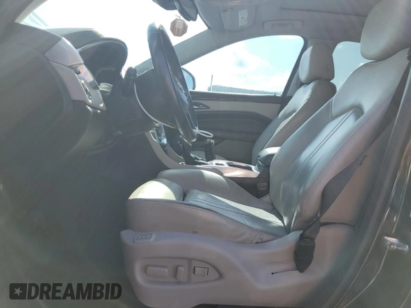2013 Cadillac SRX Performance Collection with VIN 3GYFNHE37DS649235, listed as a Copart auction lot 56939285 with 104,692 mi miles and Salvage title. Bid and sale history available at DreamBid. Image 7.