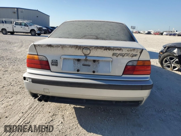 1999 BMW 3 Series 328is with VIN WBABG1338XET08298, listed as a Copart auction lot 67416004 with 0 mi miles and Clean Title. Bid and sale history available at carsss.com. Image 6.