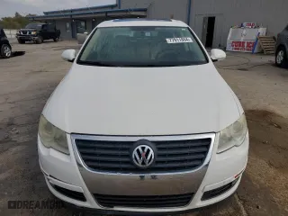 2009 Volkswagen Passat Sedan Komfort with VIN WVWJK73C59P025834, listed as a Copart auction lot 77911864 with 185,704 mi miles and Salvage Title. Bid and sale history available at carsss.com. Image 5.