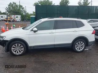 2018 Volkswagen Tiguan SEL with VIN 3VV2B7AX6JM059173, listed as a IAAI auction lot 42461175 with 86,679 mi miles and . Bid and sale history available at DreamBid. Image 14.