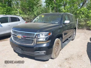 2015 Chevrolet Tahoe LTZ z VIN 1GNSKCKC8FR141163, wystawiony jako IAAI lot #42114008 z przebiegiem 221 804 mil mil oraz . Historia ofert i sprzedaży dostępna na DreamBid. Obrazek 17.