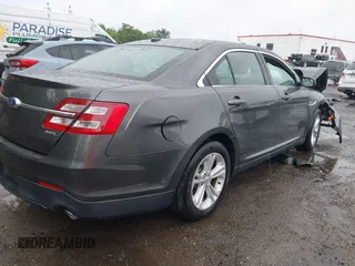 2018 Ford Taurus SEL z VIN 1FAHP2E85JG101221, wystawiony jako IAAI lot #42242127 z przebiegiem 123 787 mil mil oraz . Historia ofert i sprzedaży dostępna na DreamBid. Obrazek 4.