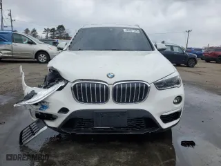 2017 BMW X1 xDrive28i with VIN WBXHT3C31H5F85452, listed as a Copart auction lot 50351125 with 61,954 mi miles and Salvage Title. Bid and sale history available at carsss.com. Image 5.