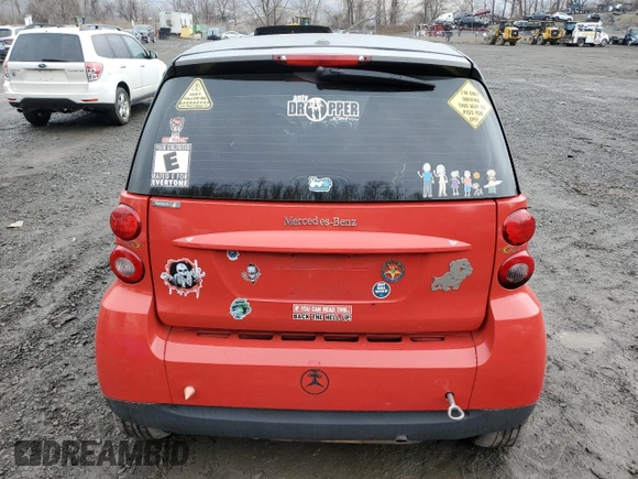 2012 Smart fortwo Pure z VIN WMEEJ3BA2CK571073, wystawiony jako Copart lot #51215135 z przebiegiem 78 686 mil mil oraz Szkoda całkowita • Salvage title. Historia ofert i sprzedaży dostępna na DreamBid. Obrazek 6.