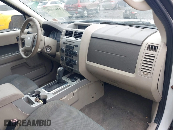 2009 Ford Escape Hybrid with VIN 1FMCU59309KA42631, listed as a IAAI auction lot 41809054 with 140,696 mi miles and . Bid and sale history available at DreamBid. Image 5.
