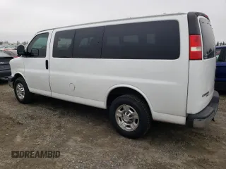 2012 Chevrolet Express Passenger 1LT with VIN 1GAZGYFG8C1174282, listed as a Copart auction lot 86012024 with 170,680 mi miles and Salvage title. Bid and sale history available at DreamBid. Image 2.