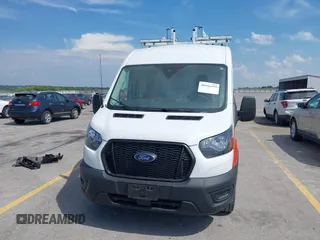 2023 Ford Transit Cargo with VIN 1FTBR1C80PKA43077, listed as a IAAI auction lot 40182475 with 15,656 mi miles and . Bid and sale history available at DreamBid. Image 13.