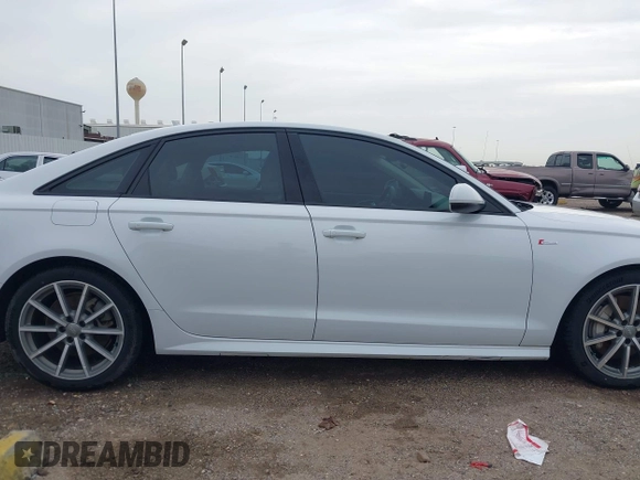 2018 Audi A6 Premium Plus z VIN WAUG3AFC7JN041708, wystawiony jako IAAI lot #41670779 z przebiegiem 91 753 mil mil oraz . Historia ofert i sprzedaży dostępna na DreamBid. Obrazek 14.