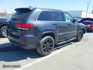 2015 Jeep Grand Cherokee Altitude with VIN 1C4RJFAG8FC954649, listed as a IAAI auction lot 41906591 with 76,804 mi miles. Bid and sale history available at carsss.com. Image 4.