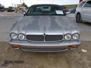 1999 Jaguar XJ with VIN SAJHX1043XC856474, listed as a IAAI auction lot 41626649 with 103,266 mi miles and . Bid and sale history available at DreamBid. Image 6.
