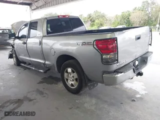 2007 Toyota Tundra SR5 with VIN 5TBBT541X7S453008, listed as a IAAI auction lot 41380611 with 153,181 mi miles. Bid and sale history available at carsss.com. Image 3.