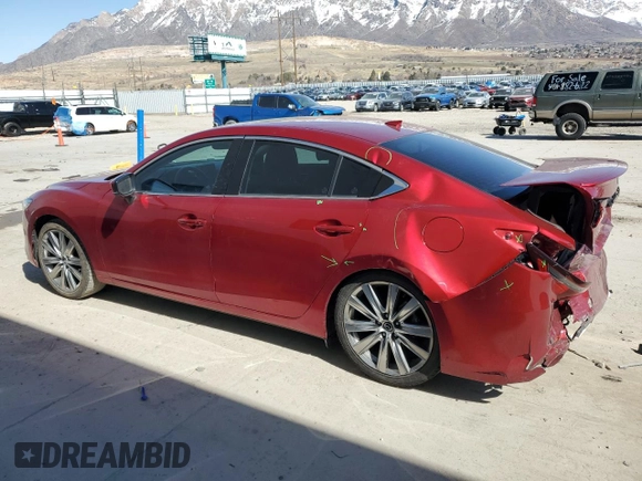 2021 Mazda 6 Carbon Edition with VIN JM1GL1WY8M1605828, listed as a Copart auction lot 48435225 with 70,917 mi miles and Salvage Title. Bid and sale history available at DreamBid. Image 2.