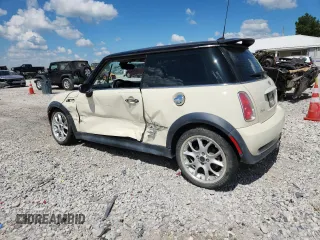 2006 MINI Hardtop S with VIN WMWRE33556TJ38543, listed as a Copart auction lot 62420145 with 105,656 mi miles and Salvage title. Bid and sale history available at DreamBid. Image 2.