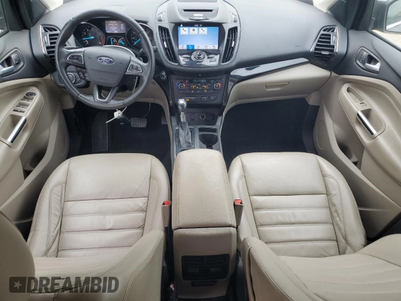 2017 Ford Escape Titanium with VIN 1FMCU0J98HUF09588, listed as a Copart auction lot 48988765 with 101,887 mi miles and Salvage Title. Bid and sale history available at DreamBid. Image 8.