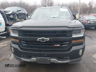 2018 Chevrolet Silverado 1500 LT with VIN 3GCUKREC5JG460979, listed as a IAAI auction lot 41741667 with 122,931 mi miles. Bid and sale history available at carsss.com. Image 13.