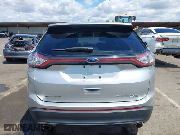 2015 Ford Edge Titanium z VIN 2FMTK4K95FBB47962, wystawiony jako IAAI lot #42234894 z przebiegiem Nie podano mil oraz . Historia ofert i sprzedaży dostępna na DreamBid. Obrazek 16.
