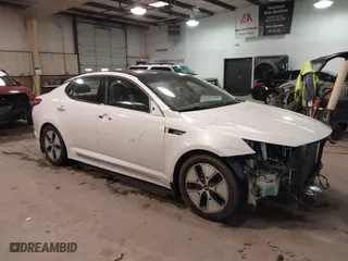 2012 Kia Optima Hybrid with VIN KNAGM4AD5C5023886, listed as a IAAI auction lot 41564218 with 124,305 mi miles. Bid and sale history available at carsss.com. Image 1.