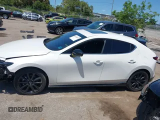 2023 Mazda 3 Premium Plus with VIN JM1BPBNY5P1603562, listed as a IAAI auction lot 42160455 with 24,271 mi miles and . Bid and sale history available at DreamBid. Image 14.