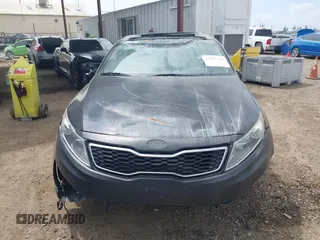 2012 Kia Optima Hybrid with VIN KNAGM4AD2C5014823, listed as a IAAI auction lot 42063169 with 125,235 mi miles. Bid and sale history available at carsss.com. Image 13.