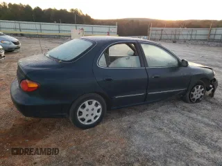 2000 Hyundai Elantra GLS z VIN KMHJF35F6YU890800, wystawiony jako Copart lot #76972294 z przebiegiem 159 134 mil mil oraz Szkoda całkowita • Salvage title. Historia ofert i sprzedaży dostępna na DreamBid. Obrazek 3.