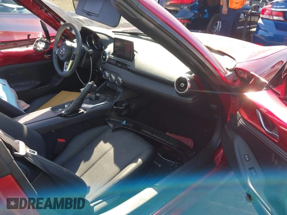 2021 Mazda MX-5 Miata Grand Touring с VIN JM1NDAM71M0459437, выставлен на аукционе IAAI как лот 41808704 с пробегом 19 368 миль миль и . История ставок и продаж доступна на DreamBid. Изображение 5.