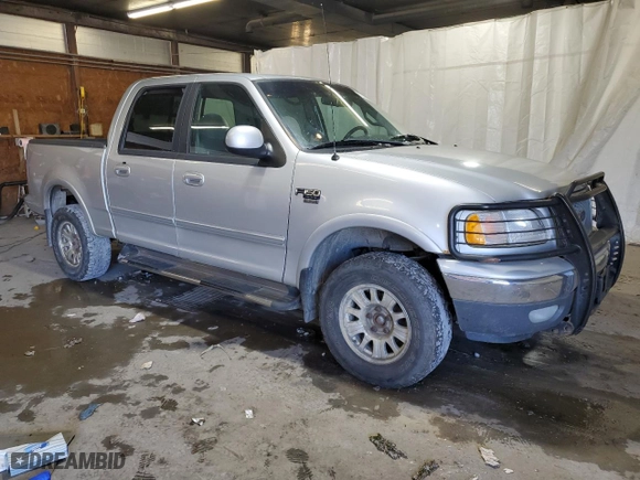 2001 Ford F-150 SuperCrew XLT with VIN 1FTRW08L41KD94810, listed as a Copart auction lot 72144184 with 191,313 mi miles and Salvage Title. Bid and sale history available at carsss.com. Image 4.