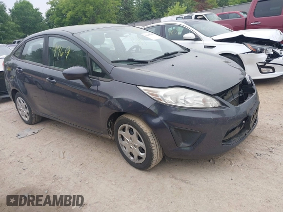 2013 Ford Fiesta S z VIN 3FADP4AJ9DM175576, wystawiony jako IAAI lot #42449969 z przebiegiem 123 959 mil mil oraz . Historia ofert i sprzedaży dostępna na DreamBid. Obrazek 1.
