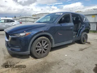 2018 Mazda CX-5 Touring with VIN JM3KFACM2J1473462, listed as a Copart auction lot 48011385 with 45,653 mi miles and Salvage Title. Bid and sale history available at carsss.com. Image 1.