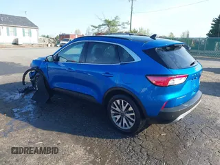 2020 Ford Escape Titanium Hybrid with VIN 1FMCU9DZ1LUB59214, listed as a IAAI auction lot 42050336 with 59,547 mi miles and . Bid and sale history available at DreamBid. Image 3.