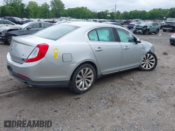 2013 Lincoln MKS with VIN 1LNHL9DK4DG606551, listed as a IAAI auction lot 42343140 with 70,424 mi miles and . Bid and sale history available at DreamBid. Image 4.