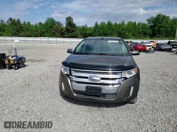 2014 Ford Edge SEL z VIN 2FMDK4JC7EBA47264, wystawiony jako Copart lot #54201255 z przebiegiem 135 408 mil mil oraz Szkoda całkowita • Salvage title. Historia ofert i sprzedaży dostępna na DreamBid. Obrazek 14.