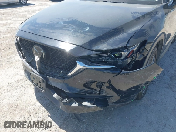 2018 Mazda CX-5 Grand Touring with VIN JM3KFADM8J0330035, listed as a IAAI auction lot 41878680 with 62,632 mi miles. Bid and sale history available at carsss.com. Image 6.
