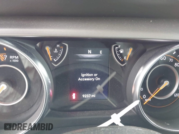 2020 Jeep Wrangler Unlimited Black and Tan with VIN 1C4HJXDG5LW187222, listed as a IAAI auction lot 42238194 with 9,237 mi miles and . Bid and sale history available at DreamBid. Image 7.