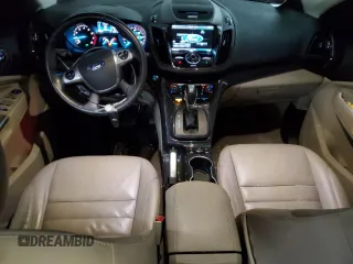 2015 Ford Escape Titanium with VIN 1FMCU0J91FUA41653, listed as a Copart auction lot 88871205 with 128,971 mi miles and Salvage Title. Bid and sale history available at DreamBid. Image 8.