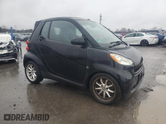 2009 Smart fortwo Passion z VIN WMEEK31X59K270597, wystawiony jako Copart lot #43187955 z przebiegiem 67 842 mil mil oraz Czysty tytuł • Clean title. Historia ofert i sprzedaży dostępna na DreamBid. Obrazek 4.